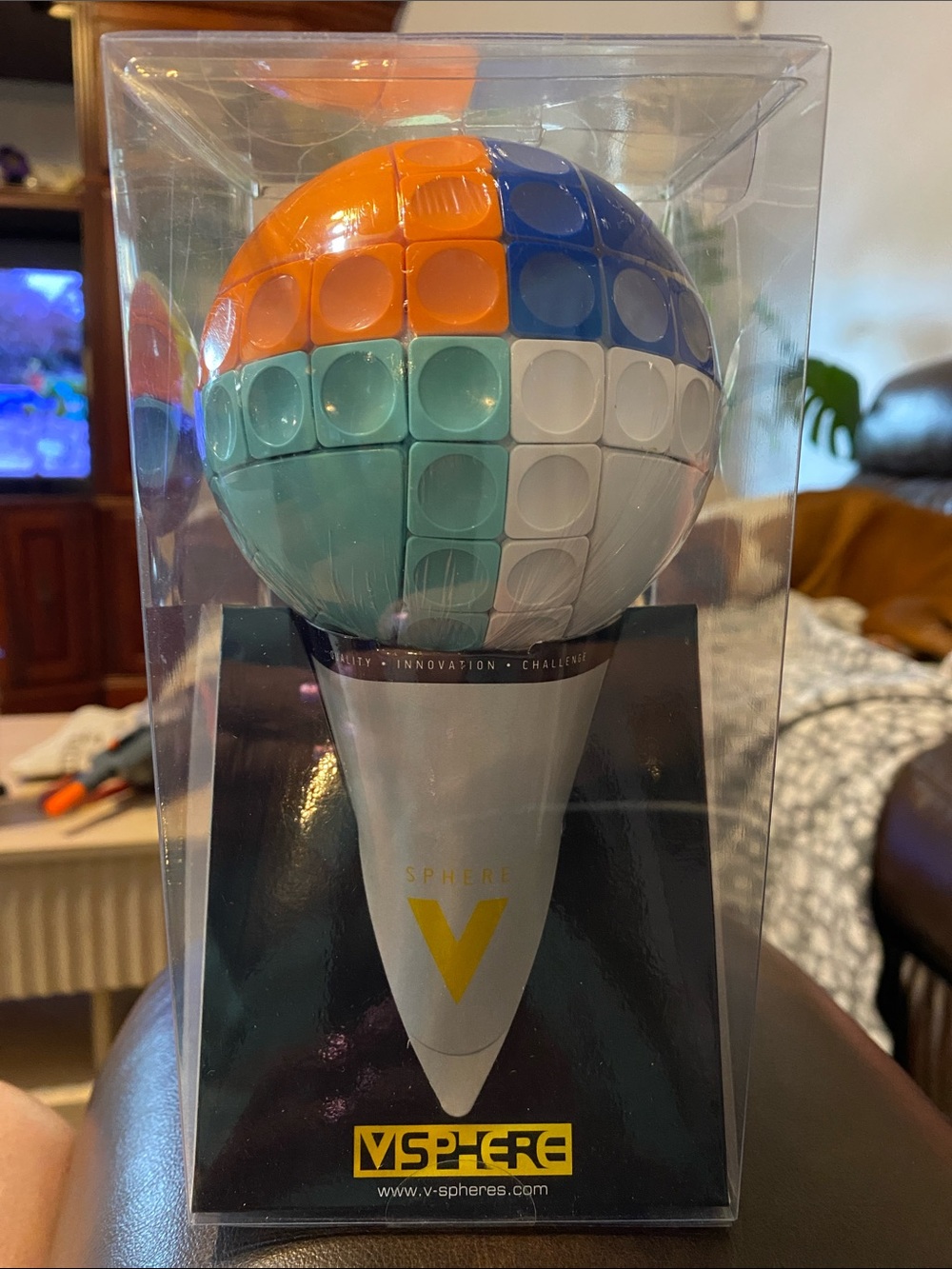 NIP V-Sphere puzzle game, like a Rubix Cube.